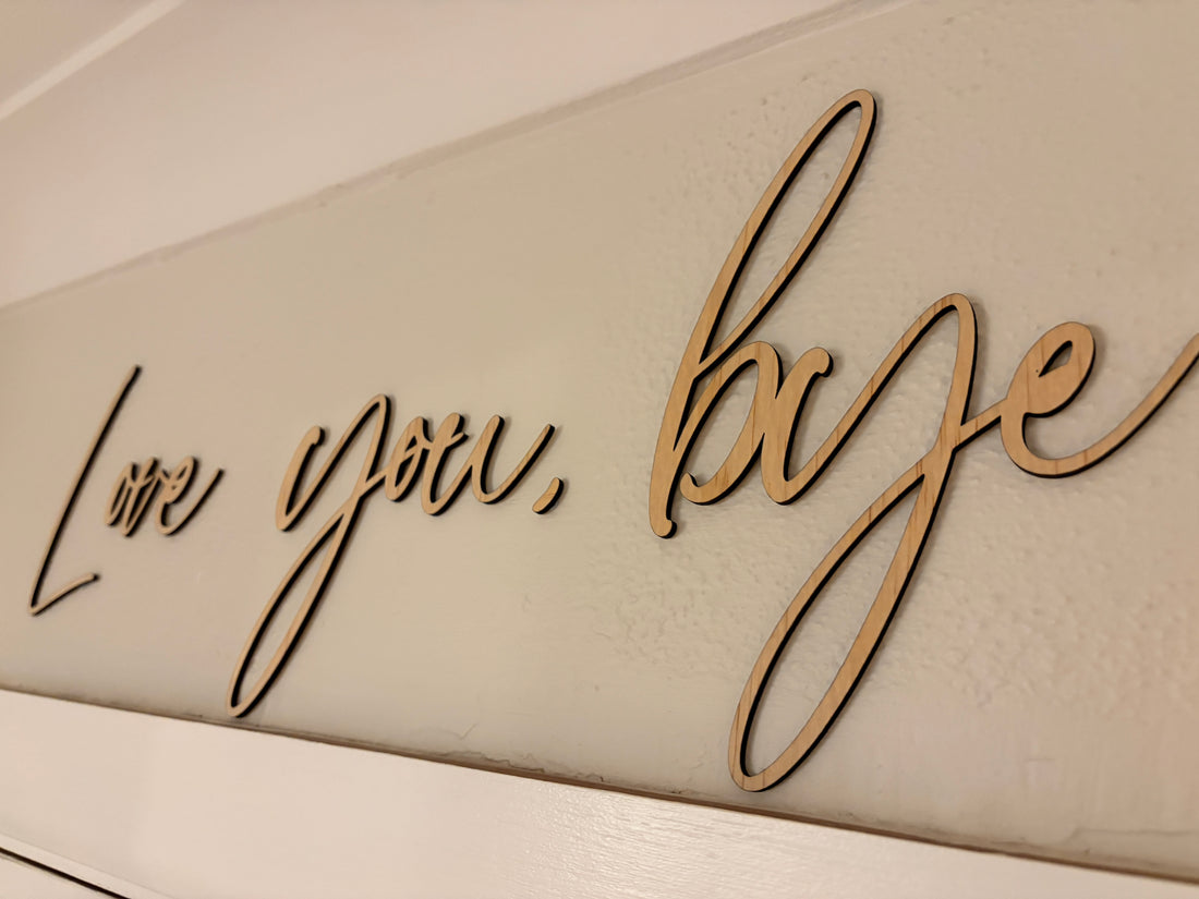 “Love you, bye” wooden wall art